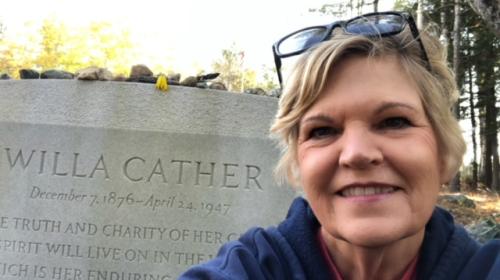 Sharon Kohout at Willa Cather's grave in Jaffrey, NH