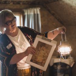 Tracy Tucker, Director of Collections and Curation, in the Willa Cather bedroom