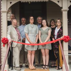 Before the Dedication: (FRONT: L to R) The Rev. Charles Peek; Executive Director, Ashley Olson; NE Youth Poet Laureate, Miranda Davis; Tracy Tucker, Director of Collections & Curation; (REAR, L to R) Matt Mason, NE State Poet; Mark Bostock, WCF President; Robert Thacker, WCF Past President; Rachel Olsen, Director of Education & Engagement 