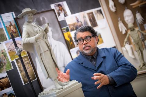 Littleton Alston with his sculpture of Willa Cather