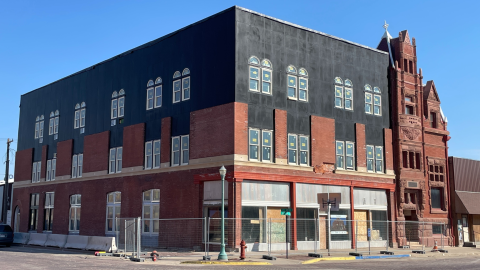 Exterior rendering of Hotel Garber in March 2023 with a third floor now encapsulated