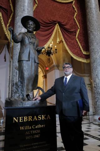 Littleton Alston with his statue of Willa Cather