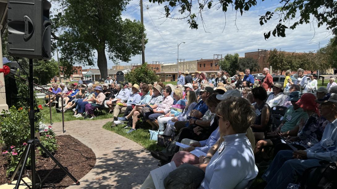 A crowd of over 100 people gathered for the Dedication and Ribbon-Cutting Ceremony